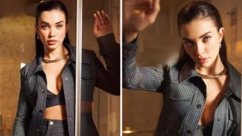 Amy Jackson takes on the role of Boss Lady in a pinstriped pantsuit for the promotion of Crakk