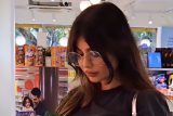 Ayesha Takia’s love for books is visible as she surfs the library