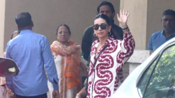 Karisma Kapoor waves at paps as she gets clicked in the city