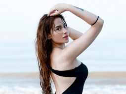Water baby! Mahira Sharma enjoys some beachy waves in this sizzling black dress