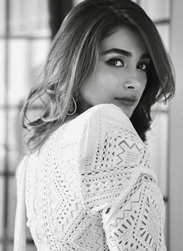 Pooja Hegde minimally ups her ethnic glam game in a beautiful white cut-out saree