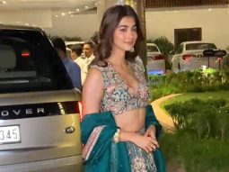 Pooja Hegde smiles for paps as she arrives in a beautiful lehenga