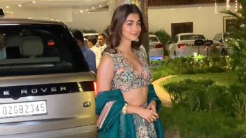 Pooja Hegde smiles for paps as she arrives in a beautiful lehenga