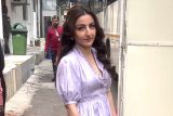 Soha Ali Khan smiles for paps as she gets clicked outside her vanity van