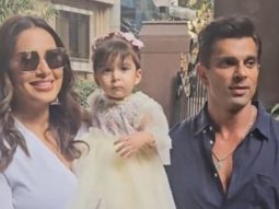 Baby Devi looks amused as she poses for paps with mumma-papa, Bipasha & Karan Singh Grover