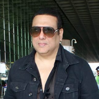 Govinda looks dapper dressed in all black as he smiles for paps at the airport