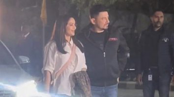 Madhuri Dixit smiles as she poses with husband Sriram Nene