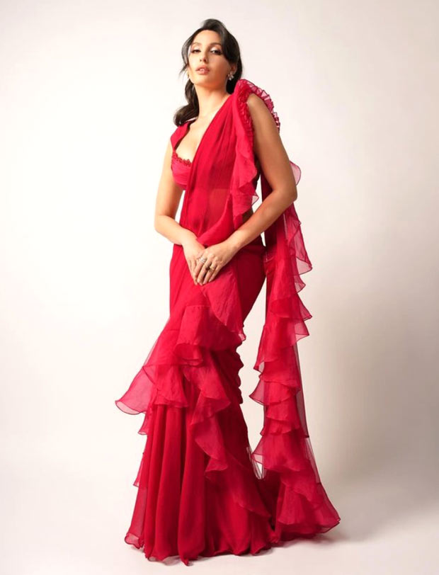 Nora Fatehi looks quite the stunner in red ruffled saree by Ridhi Mehra