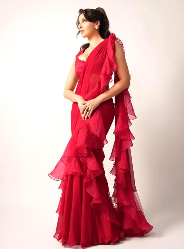 Nora Fatehi looks quite the stunner in red ruffled saree by Ridhi Mehra