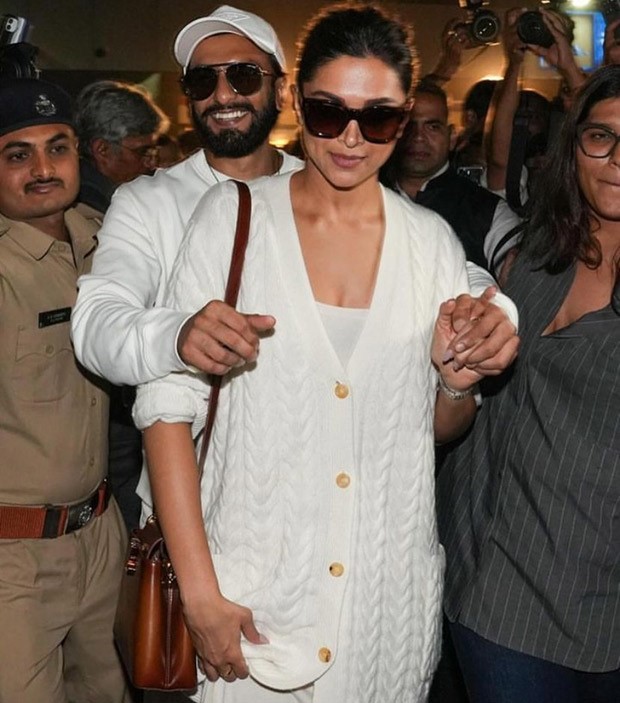 Pregnant Deepika Padukone stuns in a white maxi dress and Rs. 1.9 lakh Max Mara cardigan at the airport with Ranveer Singh, see pics