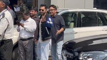 Varun Dhawan gets clicked at the airport by paps as he leaves for Jamnagar
