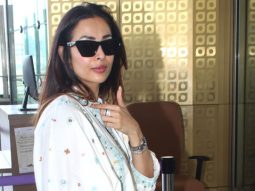 Malaika Arora gets clicked at the airport in her white salwar