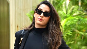 Nora Fatehi looks classy in her black top and denims