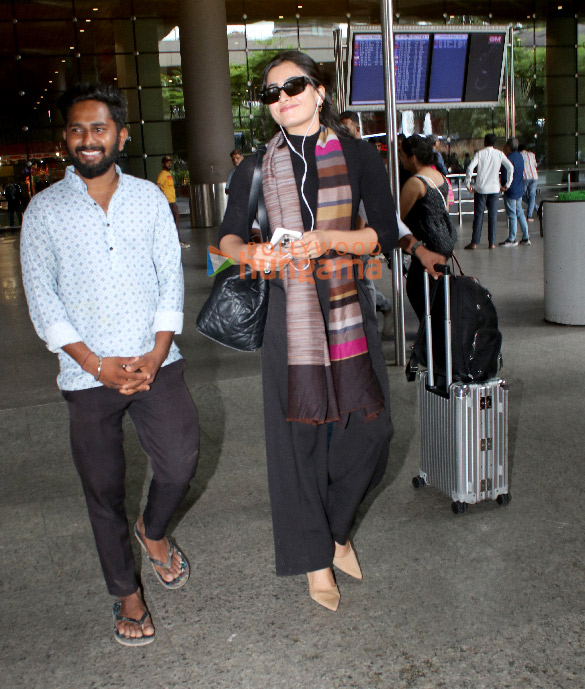 Photos: Rashmika Mandana and Jr NTR snapped at the airport Photos: Rashmika Mandana and Jr NTR snapped at the airport
