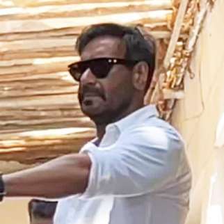Ajay Devgn gets clicked in a simple white shirt as he steps out