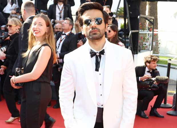 Ayush Mehra makes Cannes red carpet debut in a hand-stitched ivory tux for the premier of Kinds of Kindness