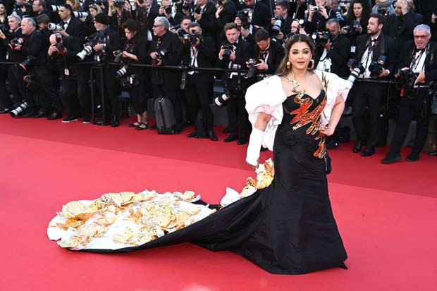 Cannes 2024 Aishwarya Rai Bachchan dazzles in Falguni Shane Peacock floor-sweeping black and white gown with gold detailing at Megalopolis world premiere 
