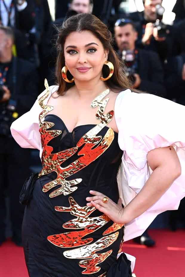 Cannes 2024 Aishwarya Rai Bachchan dazzles in Falguni Shane Peacock floor-sweeping black and white gown with gold detailing at Megalopolis world premiere 