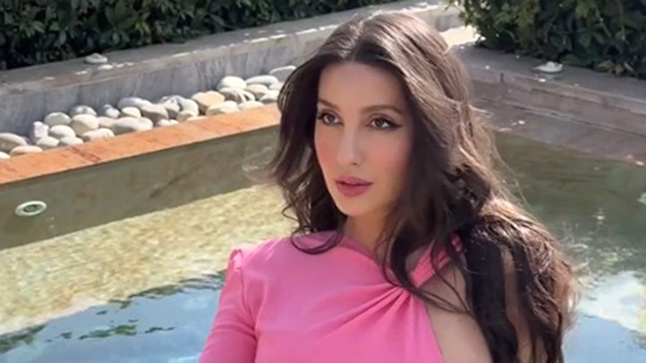 Fabulous! Nora Fatehi looks absolutely pretty in pink - Bollywood Hungama