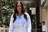 So cheerful! Neha Dhupia poses in all white for paps