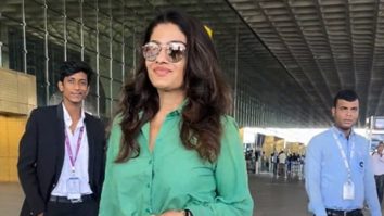Raveena Tandon strikes a pose for paps as she gets clicked at the airport