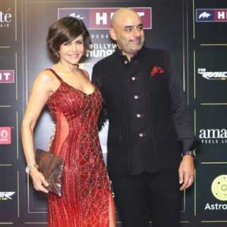 Mandira Bedi looks scintillating in her red shimmery gown as she attends the BH Style Icon Awards 2024