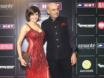 Mandira Bedi looks scintillating in her red shimmery gown as she attends the BH Style Icon Awards 2024