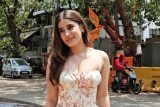 Rasha Thadani poses in a floral outfit as she gets clicked by paps
