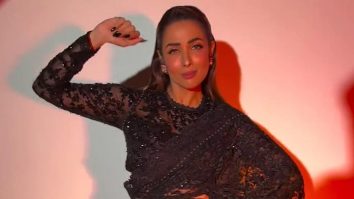 Describing grace in her beautiful black saree! Malaika Arora