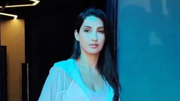 Nora Fatehi flaunts her Louis Vuitton bag as she poses for paps
