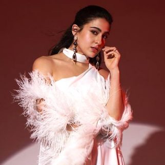 Sara Ali Khan brings elegance in a white cut-out dress paired with a luxurious fur-enrich cape