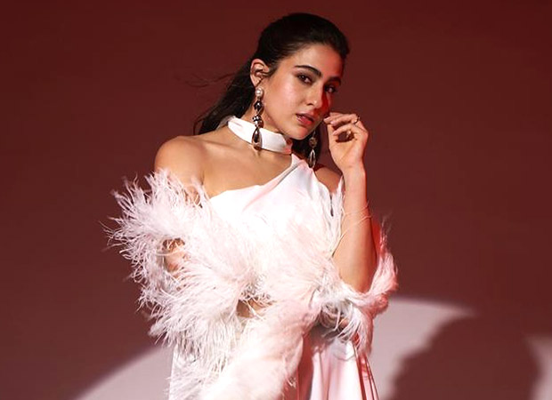 Sara Ali Khan brings elegance in a white cut-out dress paired with a luxurious fur-enrich cape