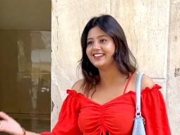 Anjali Arora smiles as she poses for paps in a red crop top & denims