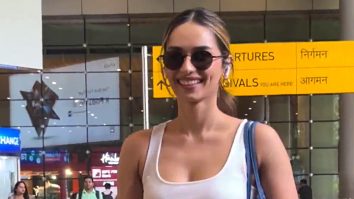 Manushi Chhillar flashes a cute dimpled smile for paps at the airport