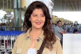 Sangeeta Bijlani strikes a pose for paps at the airport