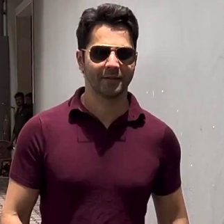 Varun Dhawan poses with fans as he gets clicked in the city