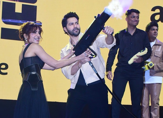 Varun Dhawan, Samantha, director duo Raj Nidimoru-Krishna DK, writer Sita Menon and Nikhil Madhok of Amazon Prime Video attended the teaser launch of Citadel: Honey Bunny in Mumbai. Varun and Samantha spoke highly of each other with Varun also sharing about the long one-take action scene they did together. Varun revealed, “I think we have an 11 or 12-minute one-take action scene.” Samantha continued, “Both of us, the cameraman etc. have to be in absolute sync. I never felt that kind of chemistry with anyone. And I believe it shows. That action sequence is truly special.” During the Q-and-A session with the media, Varun Dhawan was asked about this long one-take shot. He revealed, “More than difficult, it was challenging. When they (Raj and DK) told us about it, which they called a ‘one-er’, Samantha and I asked, ‘Yeh karenge kaise?’. We knew it would require a lot of rehearsal because there are different parts to the sequence. This scene is shot in a haveli. As we keep moving, things get more difficult. There are bombs exploding, there are grenades that we are throwing, and they are bursting in real time. It’s a very scientific process, a very technical thing.” Krishna DK stated, “We had really good hidden action talent in both of them. They had to do the stunts. There were no doubles and they were up for it.” Varun Dhawan also spoke highly about Samantha for working in such a challenging show despite battling myositis. He said, “My preparation was nothing compared to Samantha’s because it was public knowledge what she was battling with when she got onto this show. I thought I was having a hard time when I started rehearsing. But then when I’d see the work ethic that this girl had and what she was battling, that really inspired me. We became partners in making things happen. I have never been in a film or show where I have seen a co-actor go through something. You learn so much about human beings when you see someone battling something and winning. She has inspired all of us as this is an action show.” Samantha smiled at these words and added, “As he said, it was like a partnership. When we’d do action, it felt like a dance and a romantic song because there was so much synchronization. Raj-DK, being Raj-DK, they love long shots!” Another memorable episode of the event was when Varun and Samantha threw the Citadel: Honey Bunny merchandise to the audience using a gun. Citadel: Honey Bunny premieres on Amazon Prime Video on November 7. 