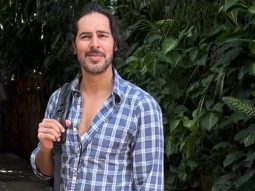 Falling for his dimples! Dino Morea strikes a pose for paps