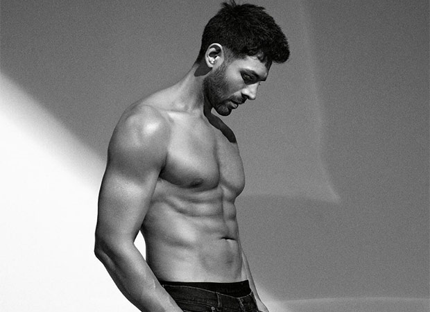 Kartik Aaryan flaunts his toned abs in the new monochrome cover of GQ 