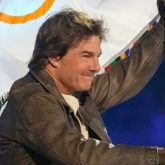 Paris Olympics 2024 Tom Cruise skydives, takes motorcycle ride as he transfers flag to LA 2028 at closing ceremony