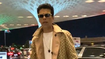 The God of classy airport look arrives in style! Karan Johar