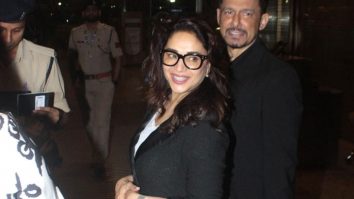 The timeless diva! Madhuri Dixit smiles for paps at the airport
