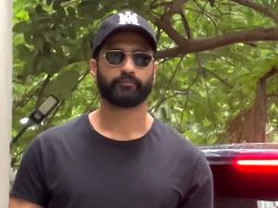 Vicky Kaushal strikes a pose for paps in a black tshirt and denims