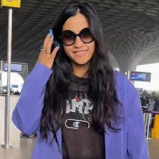 A happy and cheerful Nikhita Gandhi gets clicked at the airport