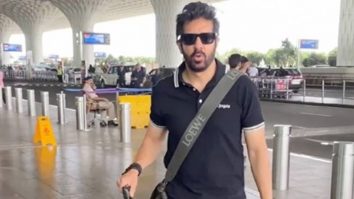 Kabir Khan gets clicked in a black tshirt at the airport