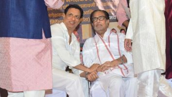 Madhur Bhandarkar poses in all white at an event