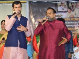 Shankar Mahadevan greets Madhur Bhandarkar at an event