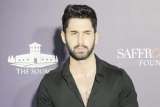 Lakshya snapped in black formals at the red carpet of Art Mumbai opening party