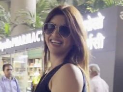 Akanksha Puri dances with a pap on the airport