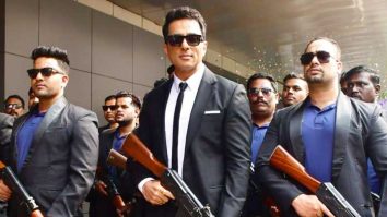 Sonu Sood posing with guns at the trailer launch of film Fateh